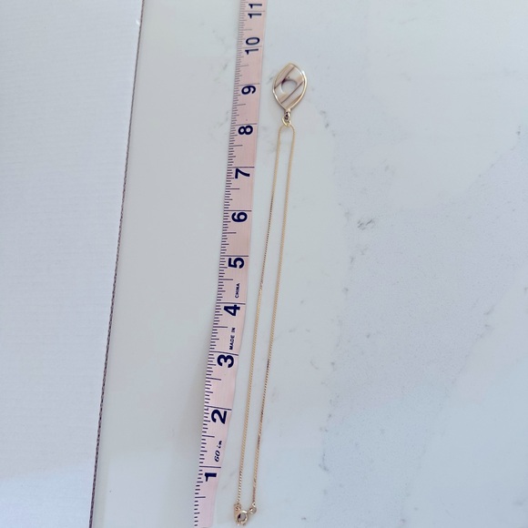 Cream and brown gold tone metal wrapped pendant on gold tone necklace - Picture 4 of 6